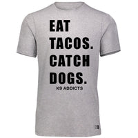 Eat Tacos Catch Dogs Dri-Power Tee